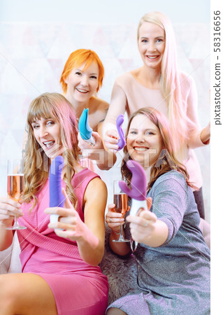 Women showing sex toys they bought at a dildo party 58316656