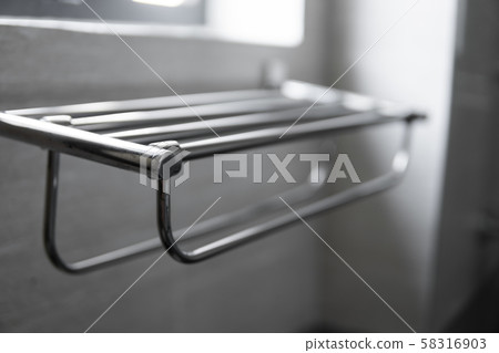 Metal Towel Dryers in the modern bathroom. 58316903