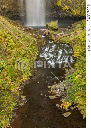 The lower part of the first level of the Multnomah waterfall located at Multnomah Creek in the The lower part of the first level of the Multnomah waterfall located at Multnomah Creek in the 58317656