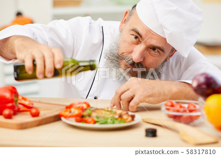 Finishing Touches to Culinary Masterpiece Finishing Touches to Culinary Masterpiece 58317810