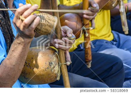 Berimbau players during presentation of Brazilian Berimbau players during presentation of Brazilian 58318069