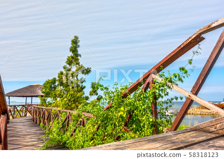 Wooden Pier to sunset hut ultra long exposure 58318123
