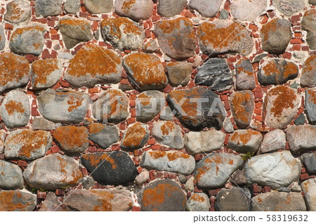 The image of an ancient wall of boulders and bricks as the background 58319632