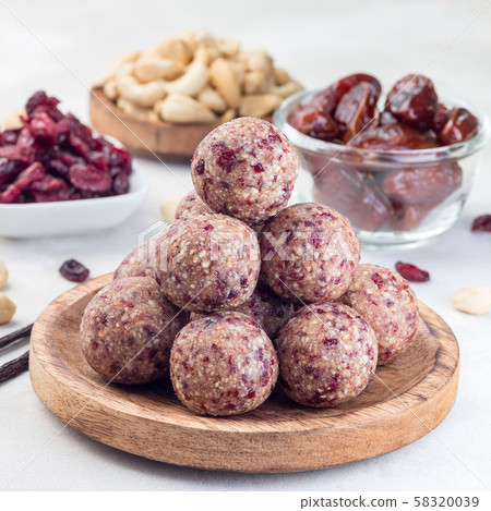 Healthy homemade energy balls with cranberries 58320039
