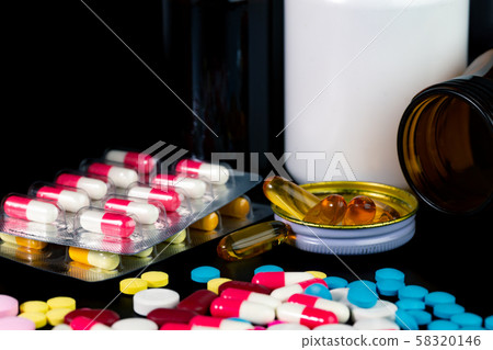group of pills and bottle of medicine group of pills and bottle of medicine 58320146