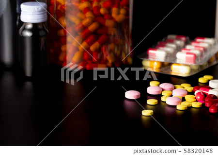 group of pills and bottle of medicine group of pills and bottle of medicine 58320148