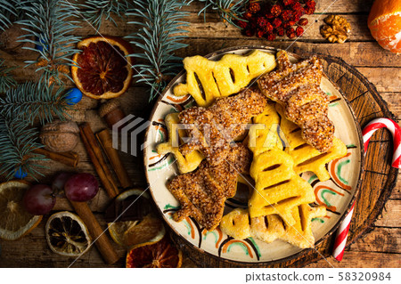 Christmas tree shaped pastry and sweets Christmas tree shaped pastry and sweets 58320984