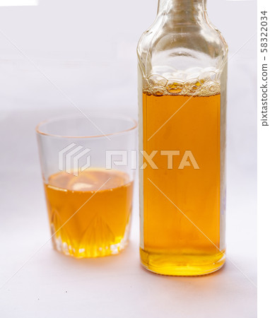 healthy linseed oil  шт  a  glass  and  near    small bottle 58322034