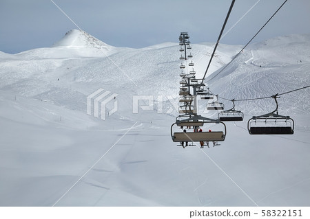 Ski lift at a ski resort 58322151