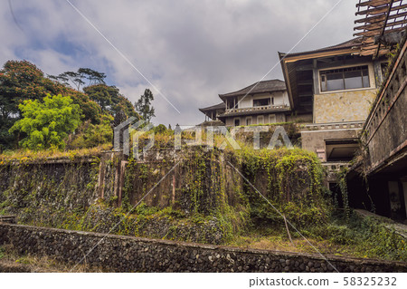 Abandoned and mysterious hotel in Bedugul. Indonesia, Bali Island Abandoned and mysterious hotel in Bedugul. Indonesia, Bali Island 58325232