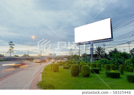 Street long exposure with Blank billboard white on road curve. 58325448