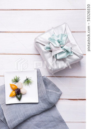Concept of Korean traditional objects, wrapping cloth and refreshments. 022 Concept of Korean traditional objects, wrapping cloth and refreshments. 022 58326830
