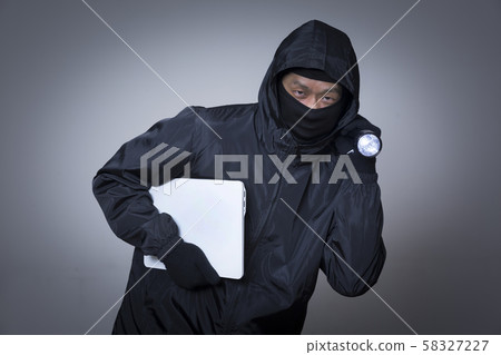 Criminal concept photo, Male Thief in Black Mask 096 Criminal concept photo, Male Thief in Black Mask 096 58327227
