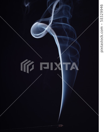 Abstract pattern of white smoke from burning 58329946