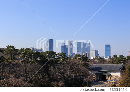 Nagoya station in the morning as seen from the south end of Nagoya Castle Nagoya station in the morning as seen from the south end of Nagoya Castle 58331434