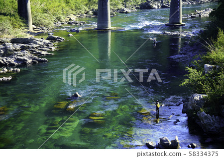 Clear stream fishing Clear stream fishing 58334375