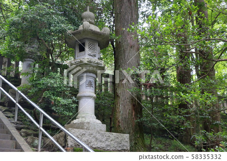 Japanese stone lantern at Hodosan Jinja Shrine in Chichibu Saitama Japan Japanese stone lantern at Hodosan Jinja Shrine in Chichibu Saitama Japan 58335332