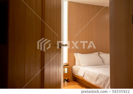 Bedroom door opened in the hotel 58335922