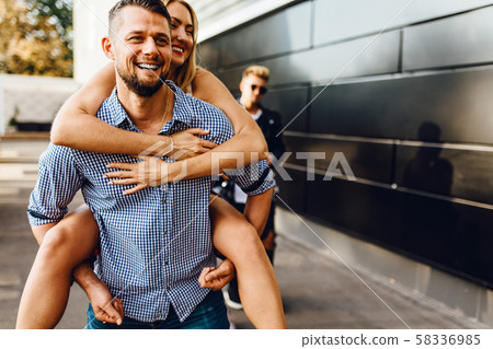 Young excited friends are having fun in the city, 58336985