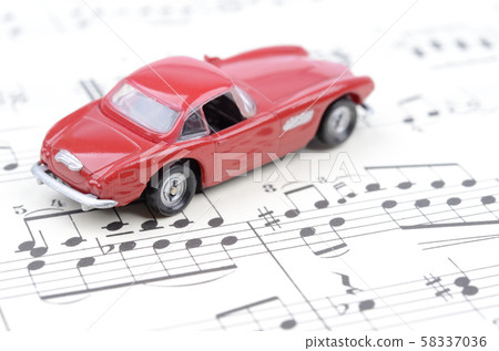 Sheet music and car Sheet music and car 58337036