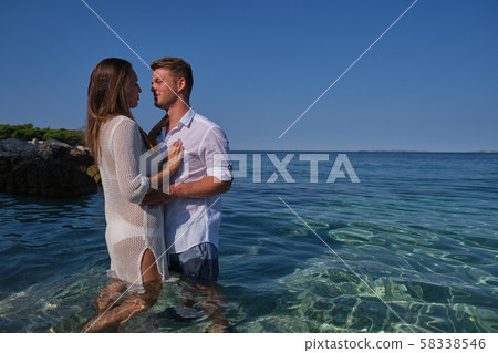 Couple in love having romantic tender moments on Couple in love having romantic tender moments on 58338546