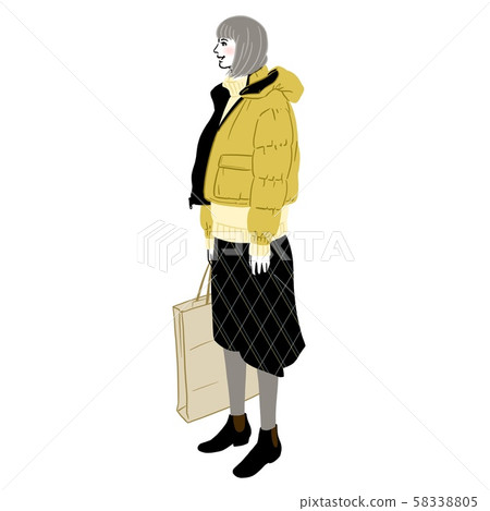 Young woman doing shopping wearing a down jacket 58338805