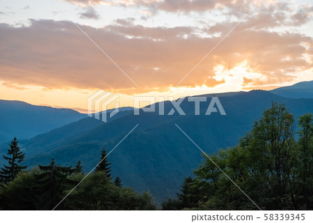 Colorful summer landscape in the mountains. Sunset Colorful summer landscape in the mountains. Sunset 58339345