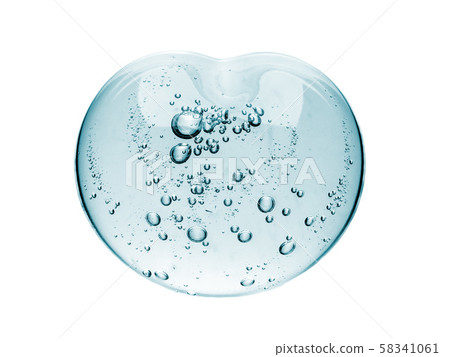 Squeezed cosmetic clear cream gel texture Iisolated on white background. Close up photo of Squeezed cosmetic clear cream gel texture Iisolated on white background. Close up photo of 58341061