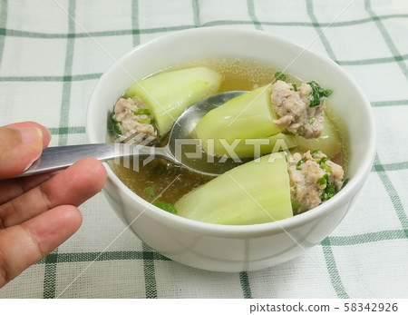 Clear Soup of Cucumber Stuffed with Minced Pork Clear Soup of Cucumber Stuffed with Minced Pork 58342926