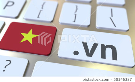Vietnamese domain .vn and flag of Vietnam on the buttons on the computer keyboard. National internet 58346387