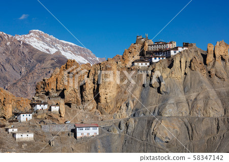 Dhankar monastry perched on a cliff in Himalayas, India 58347142