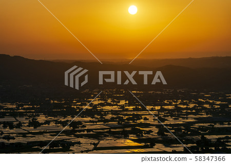 Sunset over the Sea of Japan and the scattered village seen from Mount Yaotome, Nanto City, Toyama Prefecture Sunset over the Sea of Japan and the scattered village seen from Mount Yaotome, Nanto City, Toyama Prefecture 58347366