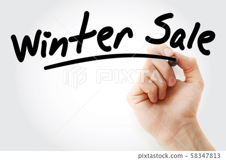 Hand writing WINTER SALE with marker 58347813