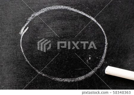 White color chalk hand drawing in circle or round shape White color chalk hand drawing in circle or round shape 58348363