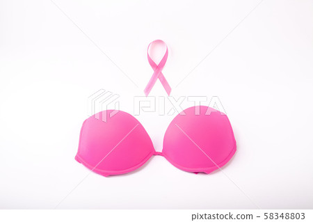 Pink ribbon and pink bra on white background 58348803