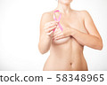 Beautiful Nude woman hold pink ribbon in hand 58348965