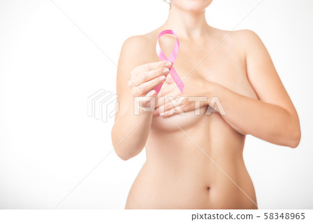 Beautiful Nude woman hold pink ribbon in hand Beautiful Nude woman hold pink ribbon in hand 58348965