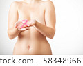 Beautiful Nude woman hold pink ribbon in hand 58348966