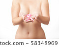 Beautiful Nude woman hold pink ribbon in hand 58348969