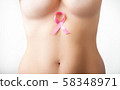 Beautiful Nude woman breast with pink ribbon 58348971