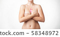 Beautiful Nude woman breast with pink ribbon 58348972