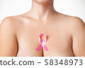 Beautiful Nude woman breast with pink ribbon 58348973