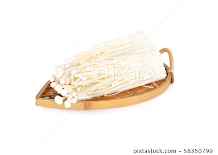 Fresh Enoki mushrooms on bamboo plate with white Fresh Enoki mushrooms on bamboo plate with white 58350799