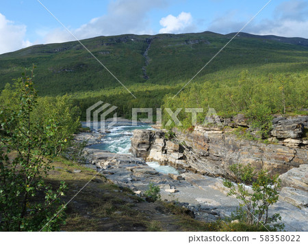 Lapland nature landscape. Abisko blue river canyon carved in the limestone and granite by glacial 58358022