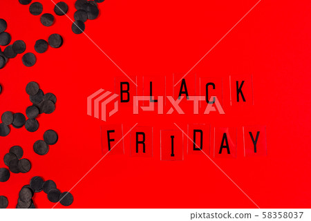 Black Friday sale tag on red background. Black Friday sale tag on red background. 58358037
