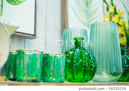 Close up composition of light green glass vases, 58358139