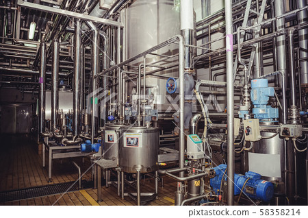 Modern brewery factory interior.Steel tanks or 58358214