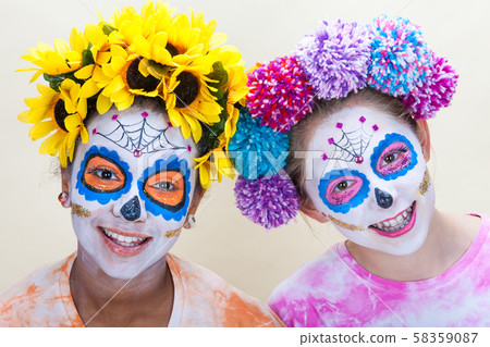 Two Teenage Girls in Dia de los Muertos Halloween 58359087