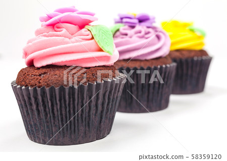 Cupcakes With Colorful Icing or Frosting 58359120