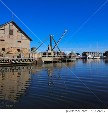 Sunnana Hamn, small harbour in Mellerud, Sweden. 58359217
